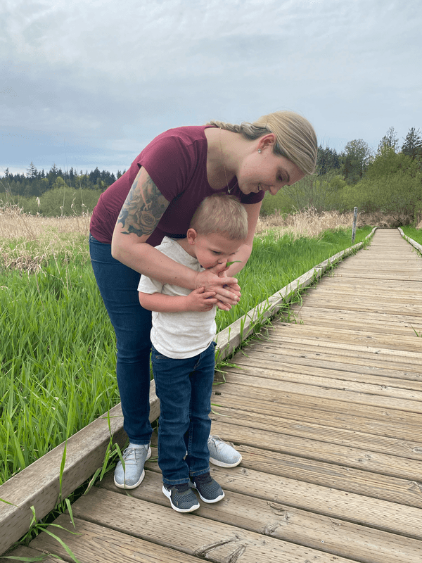 Jeannie with her child outdoors