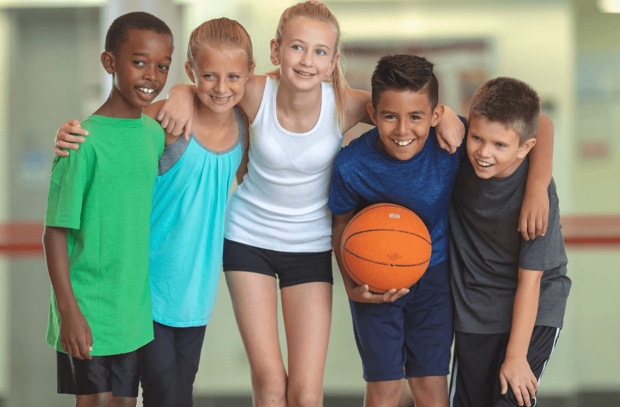 PE group with arms around each other's shoulders